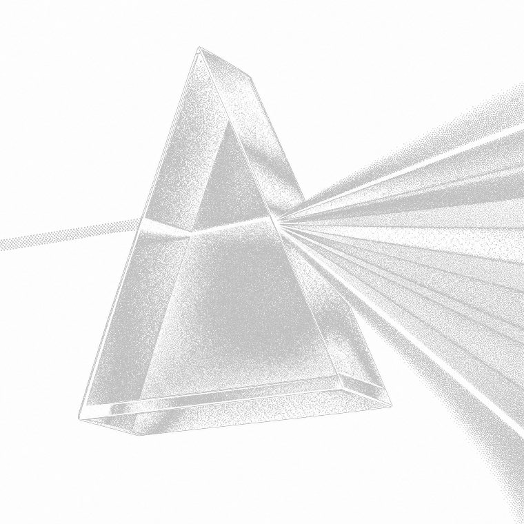 A prism splitting a beam of light into separate rays.